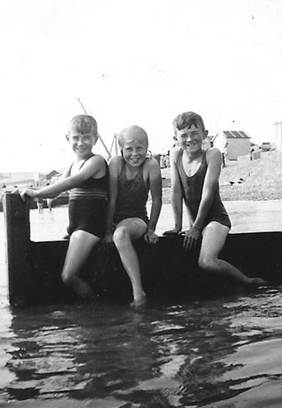 A group of boys posing for a picture

Description automatically generated with low confidence