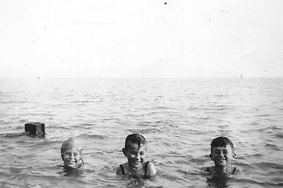 A group of people in the water

Description automatically generated with medium confidence