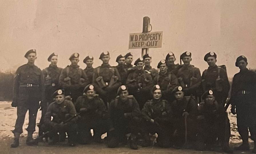A group of people posing for a photo

Description automatically generated