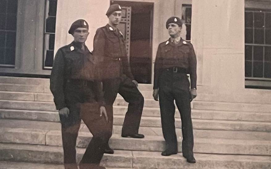 A group of men posing for a photo

Description automatically generated with medium confidence