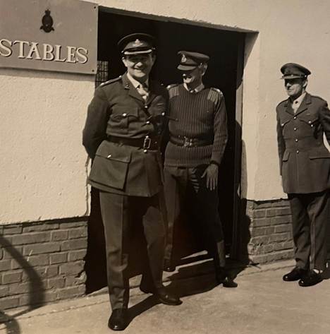 A picture containing text, person, military uniform, outdoor

Description automatically generated