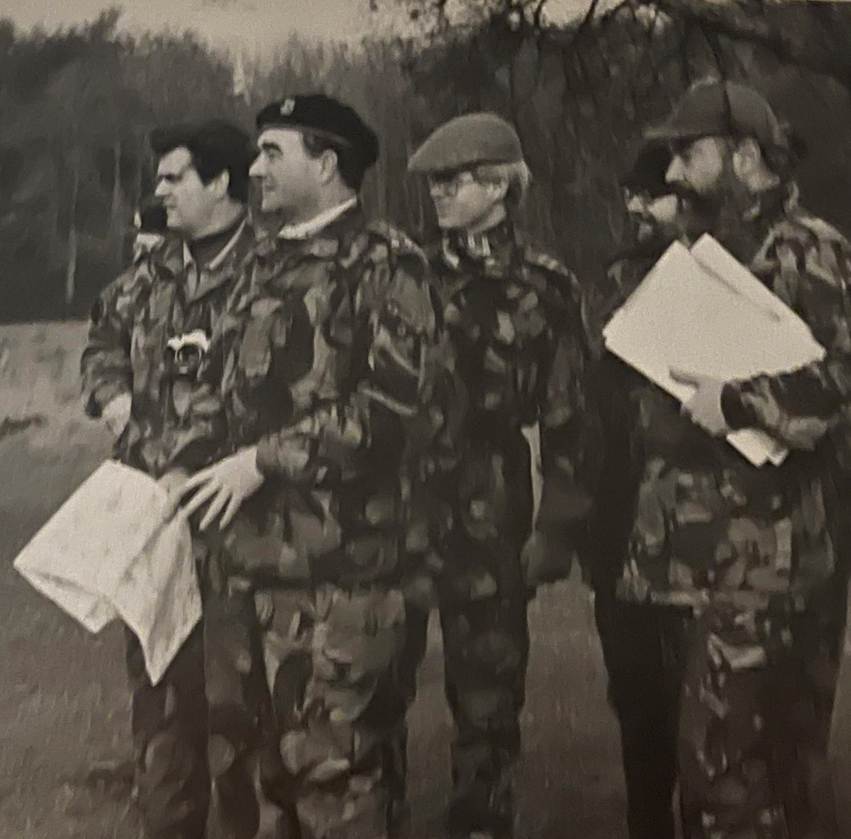 A picture containing text, person, military uniform, outdoor

Description automatically generated