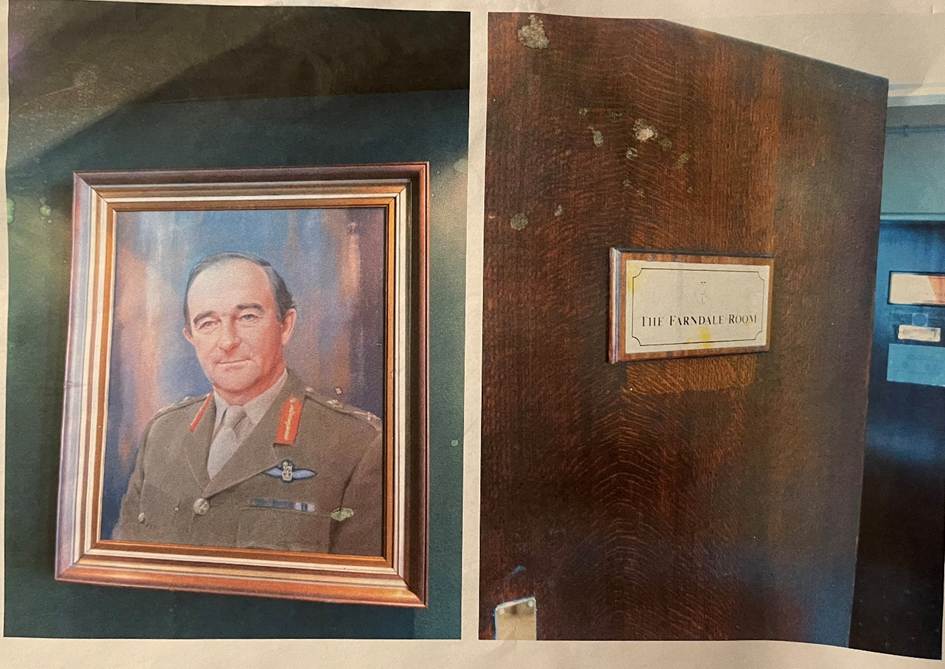 A framed picture of a person

Description automatically generated with medium confidence