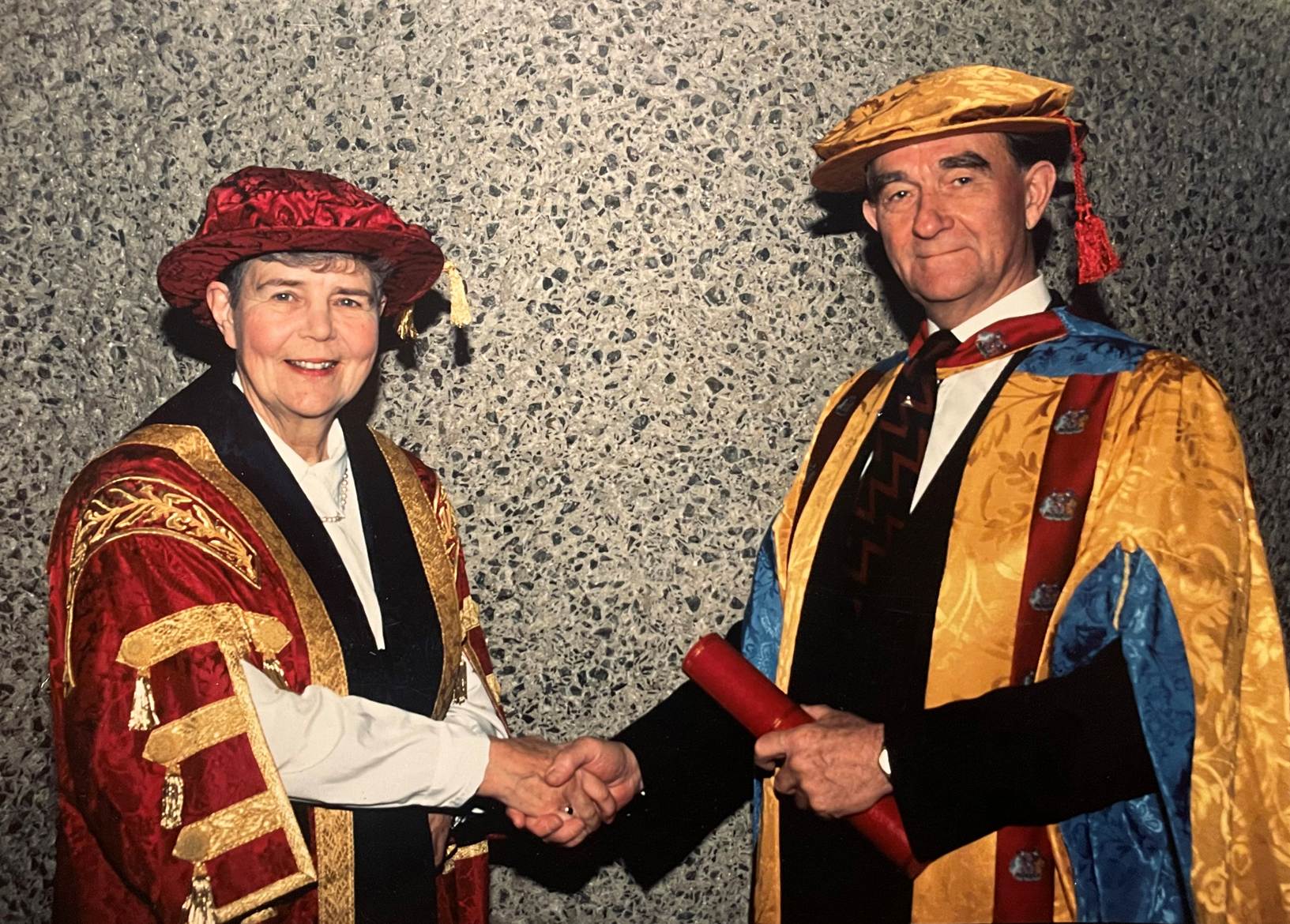 A picture containing person, academic costume, dressed

Description automatically generated