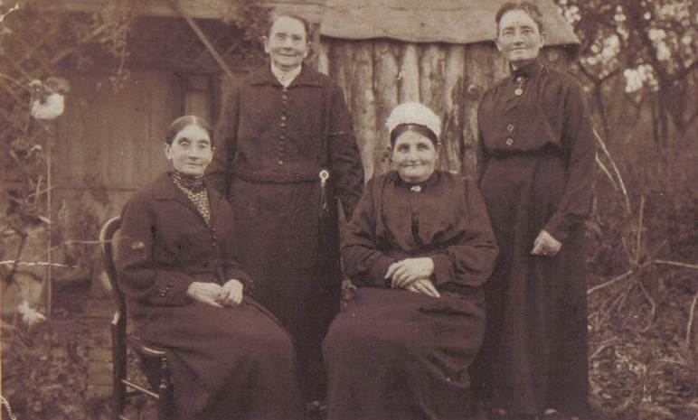 A group of people posing for a photo

Description automatically generated