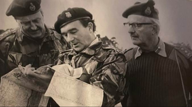 A group of men in military uniforms

Description automatically generated