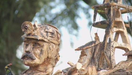A close-up of a wood carving
Description automatically generated