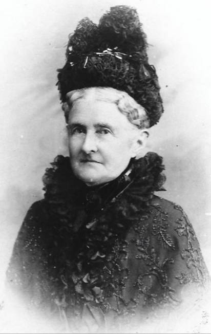 A black and white photo of a person

Description automatically generated