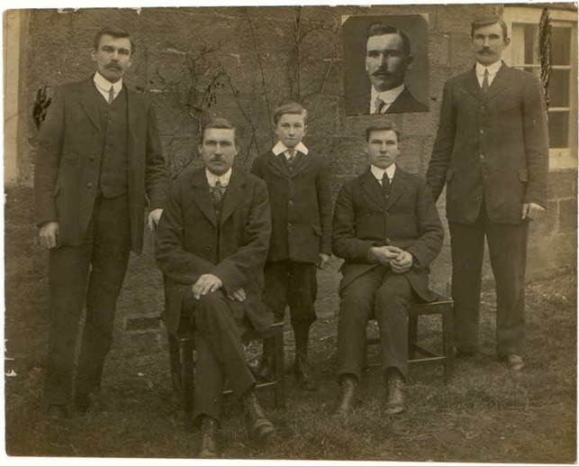 A group of men in suits

Description automatically generated