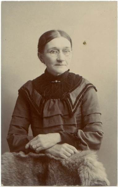 A person posing for the camera

Description automatically generated