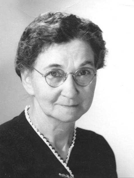 A black and white photo of a person

Description automatically generated