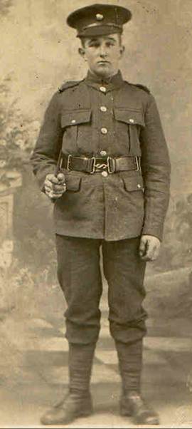 A person in a military uniform

Description automatically generated