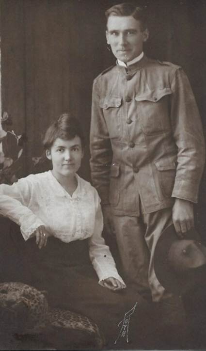 An old photo of a person

Description automatically generated