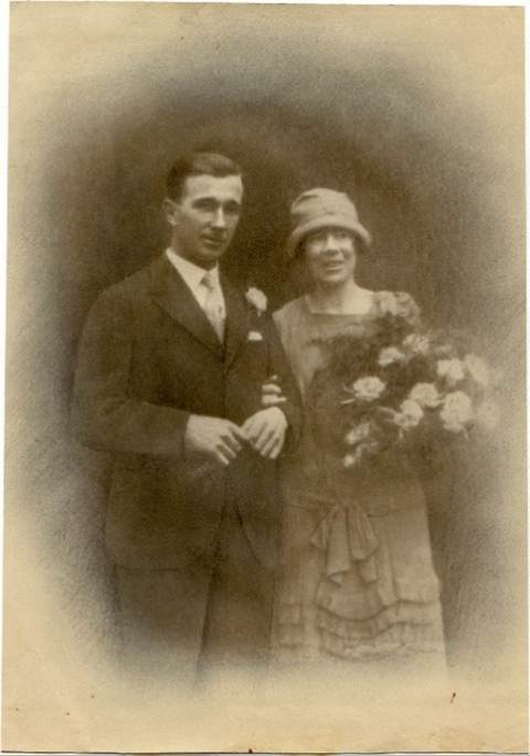 A person and person posing for a picture

Description automatically generated
