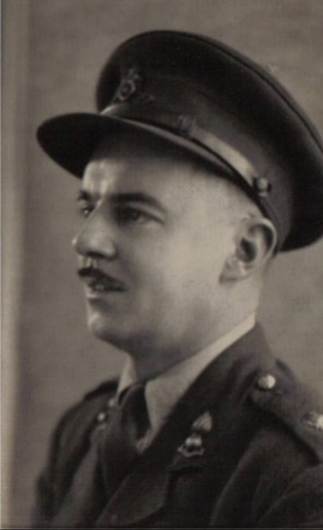A person in a military uniform
Description automatically generated