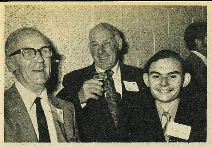 Medium shot of men smiling
Description automatically generated