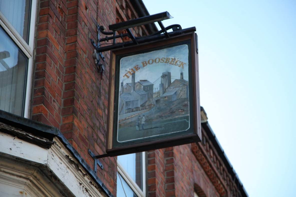 A sign on a building
Description automatically generated