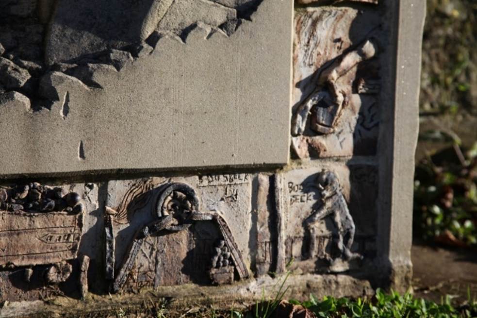 A stone carving of a person
Description automatically generated with medium confidence