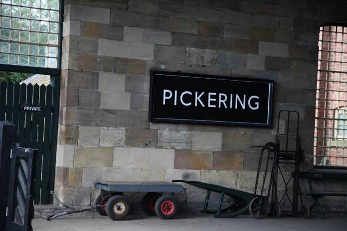 A sign on a wall
AI-generated content may be incorrect.