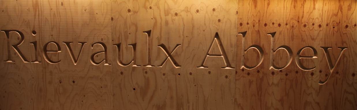 A close-up of a carved wood wall
AI-generated content may be incorrect.