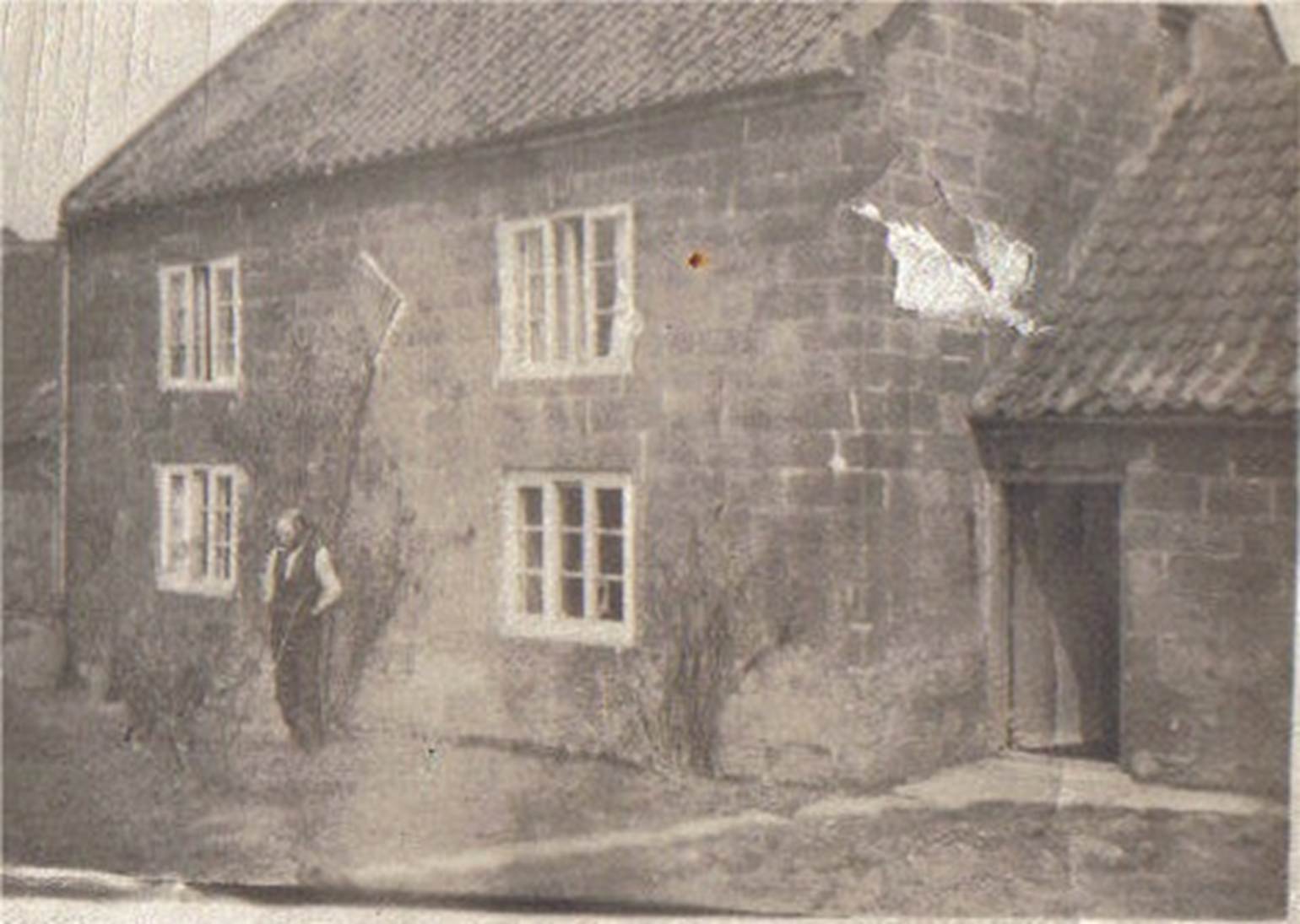 An old brick building
Description automatically generated