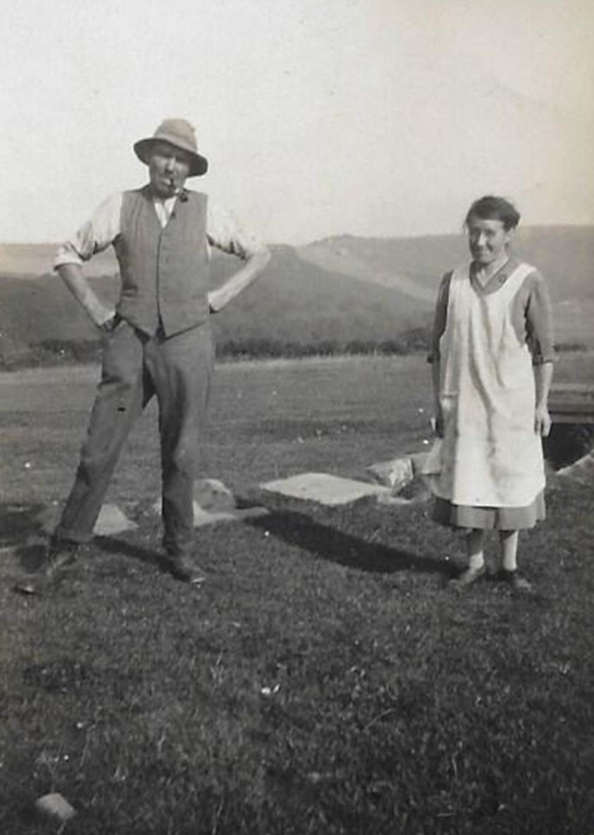 A person standing in a field
Description automatically generated